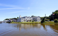 photo of water with a building in the background